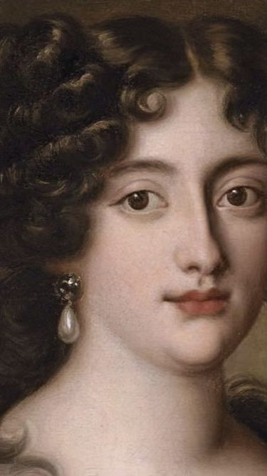 A detailed painted portrait of a woman with dark curly hair styled in an elaborate fashion, wearing a pearl earring. The image captures a calm and refined expression, reflecting historical artistic techniques and portraiture style. The background is a muted brown tone, emphasizing the subject's face and hair.
