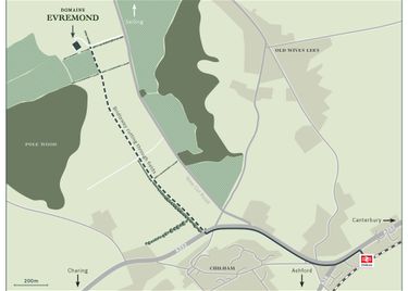 A detailed map indicating the location of Domaine Evremond vineyard near Chilham, Kent. The map highlights nearby roads, landmarks, and pathways leading to the estate, providing clear navigation for visitors. It situates the vineyard within the surrounding countryside, emphasizing its accessibility.